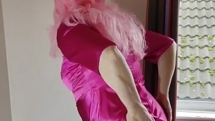 Sexy crossdresser in full hot pink satin