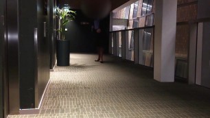 Crossdresser having Dildo fun in front of hotel elevators