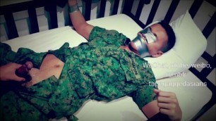 Short from Singaporean army guy tied up and tape gagged -