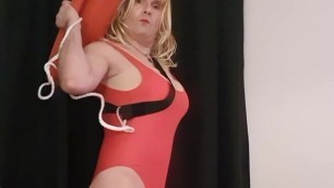 Hornyandrea jerks in the red Baywatch life guard swim suite