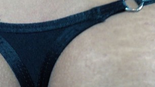 Very tiny black thong panties with the string up her ass